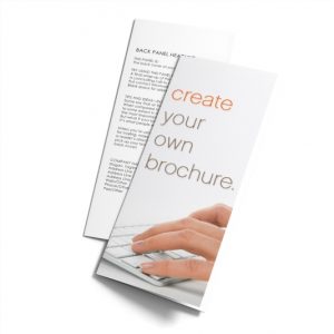 The brochure template features the words 'create your own' in orange and light-brown along with a close-up of someone's hands typing on a white keyboard.