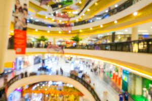 Blurred image of a large shopping mall.