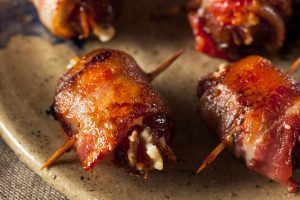 Homemade Bacon Wrapped Dates with cheese.