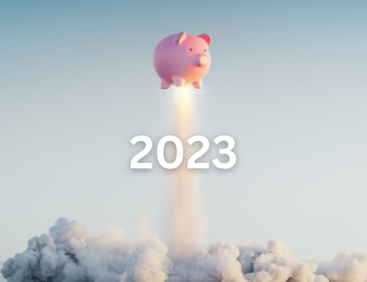 A piggy bank flying in the sky with the year 2023 displayed.
